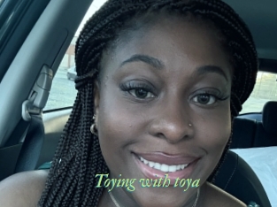 Toying_with_toya